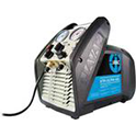 A portable refrigerant recovery machine with pressure gauges